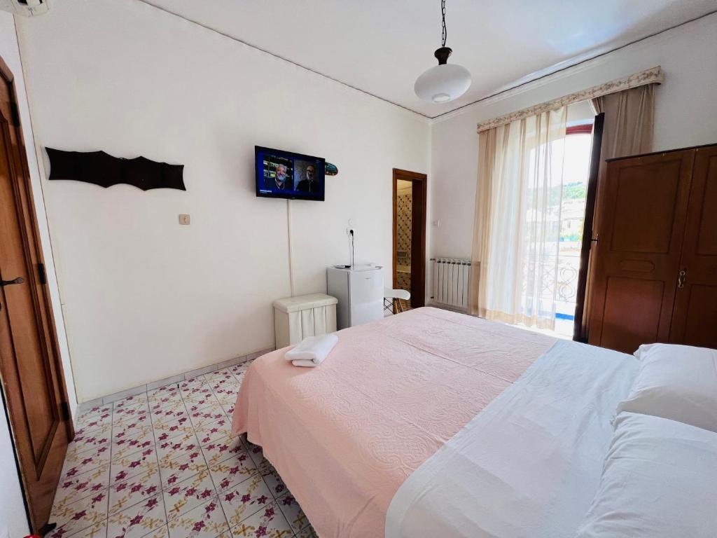 Postel nebo postele na pokoji v ubytování Villa Thomas BB conduzione familiare