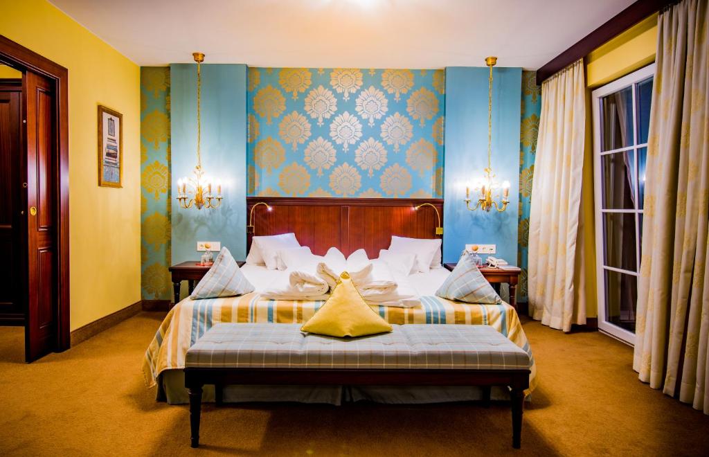 Posteľ alebo postele v izbe v ubytovaní Grandhotel Lienz Business-Wellness & Gourmet