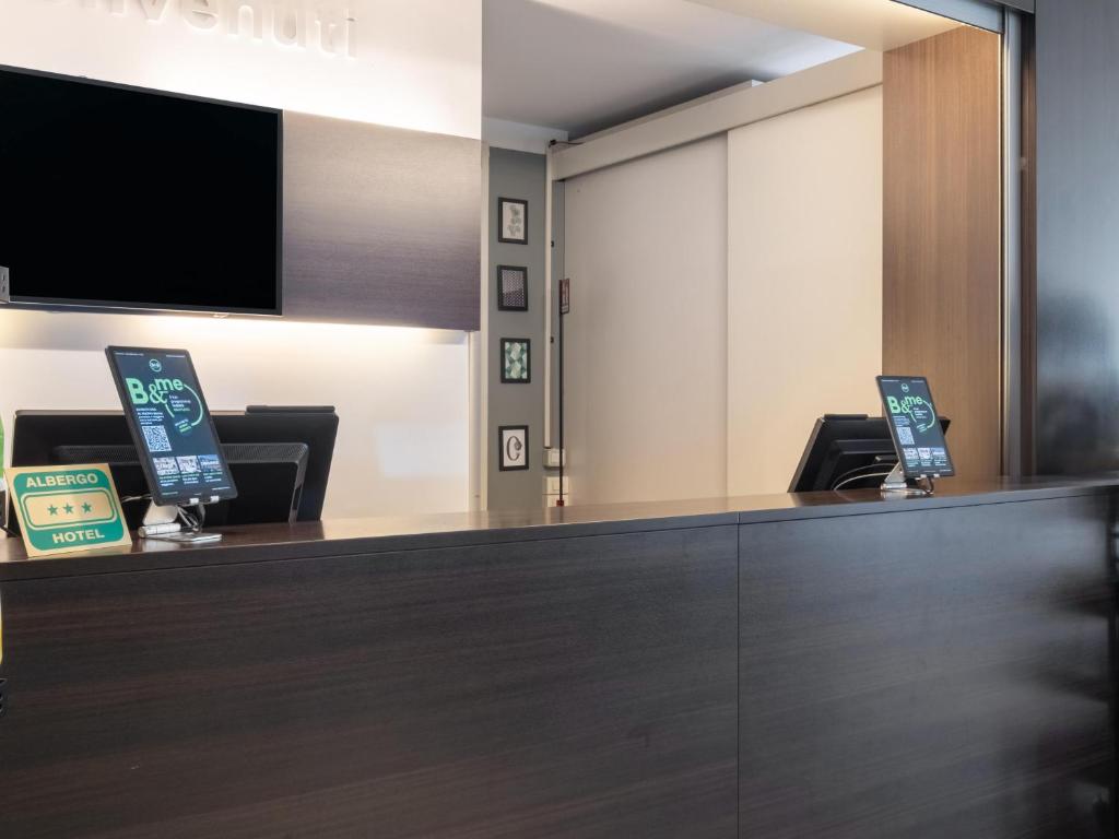 TV a/nebo společenská místnost v ubytování B&B HOTEL Mantova