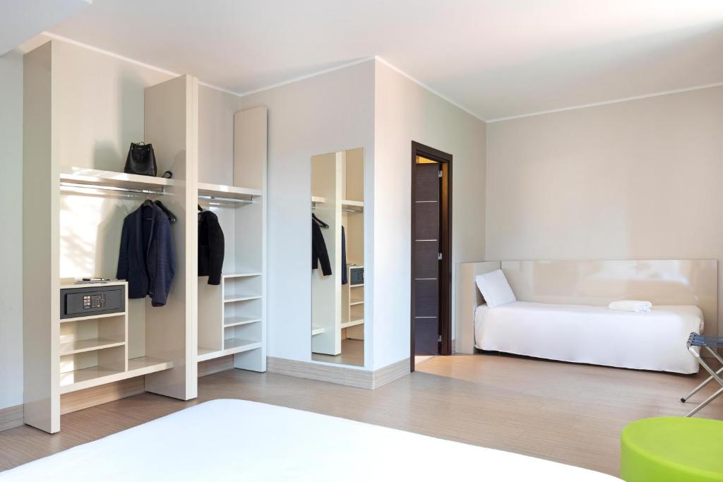 Postel nebo postele na pokoji v ubytování B&B Hotel Bergamo City