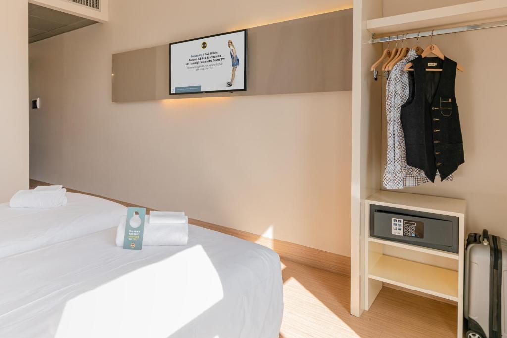 Postel nebo postele na pokoji v ubytování B&B Hotel Firenze City Center
