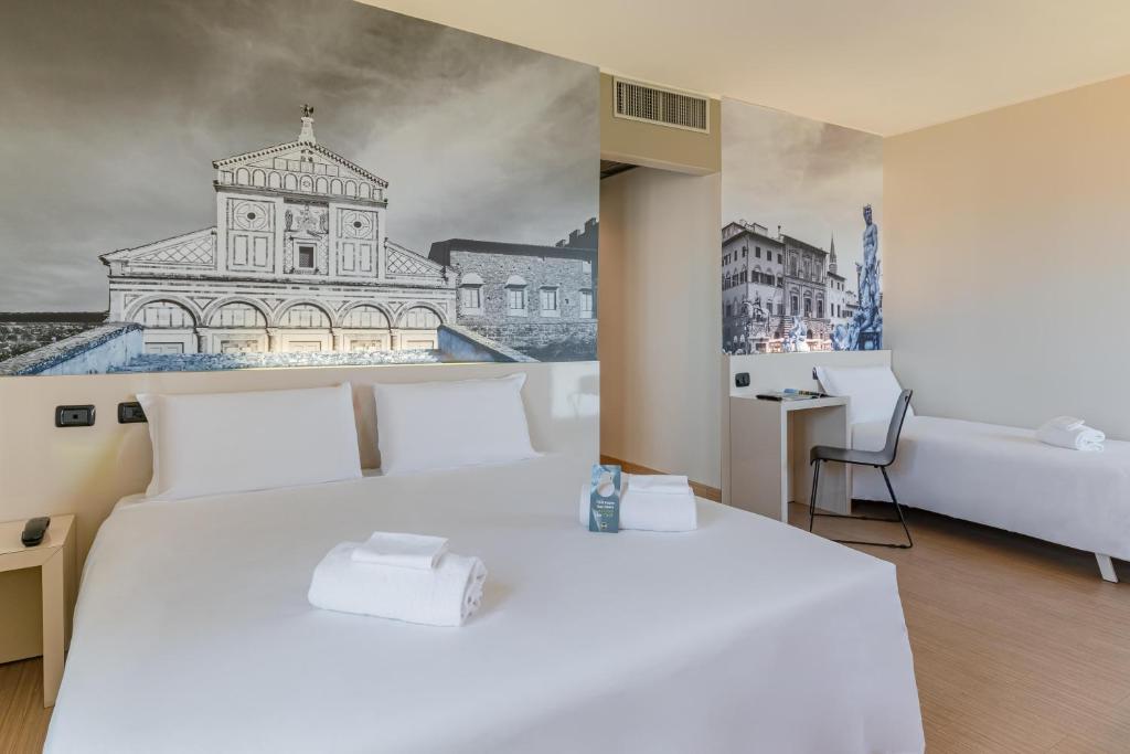 Postel nebo postele na pokoji v ubytování B&B Hotel Firenze City Center