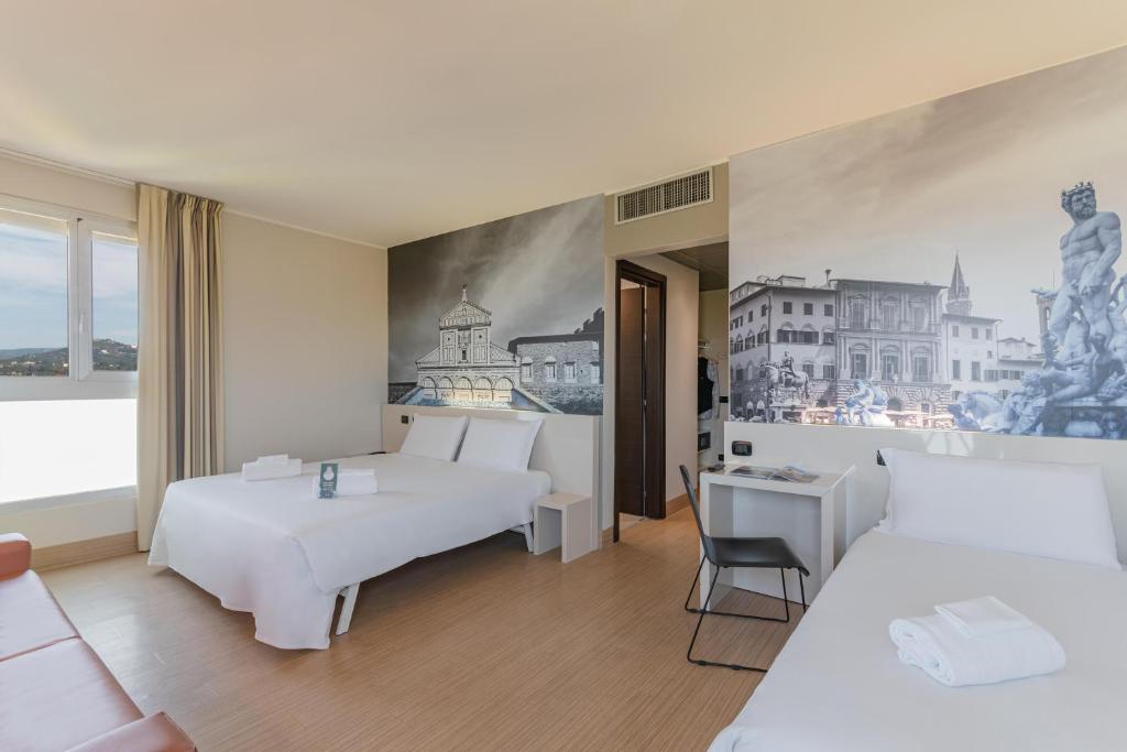 Postel nebo postele na pokoji v ubytování B&B Hotel Firenze City Center