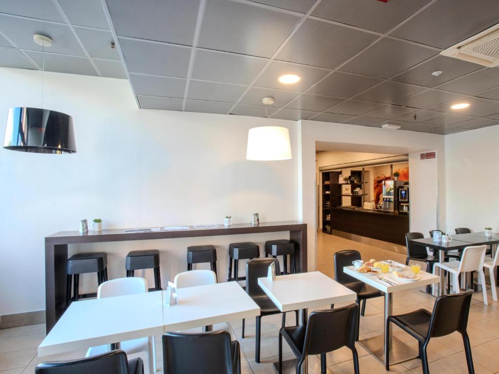 TV a/nebo společenská místnost v ubytování B&B Hotel Firenze Novoli