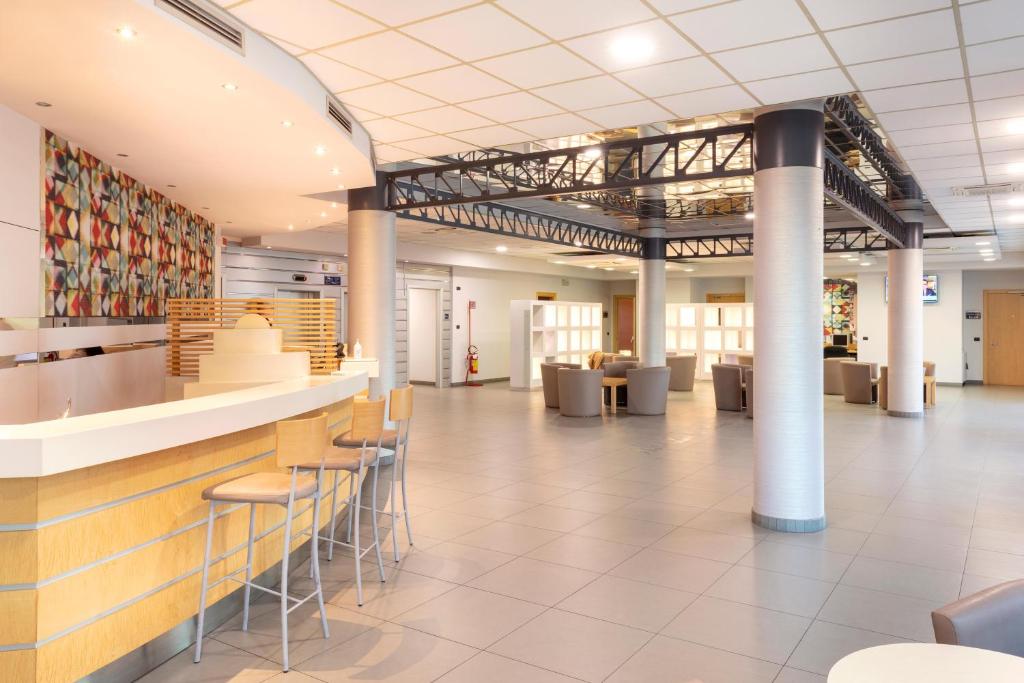 Reštaurácia alebo iné gastronomické zariadenie v ubytovaní B&B Hotel Cherasco Langhe