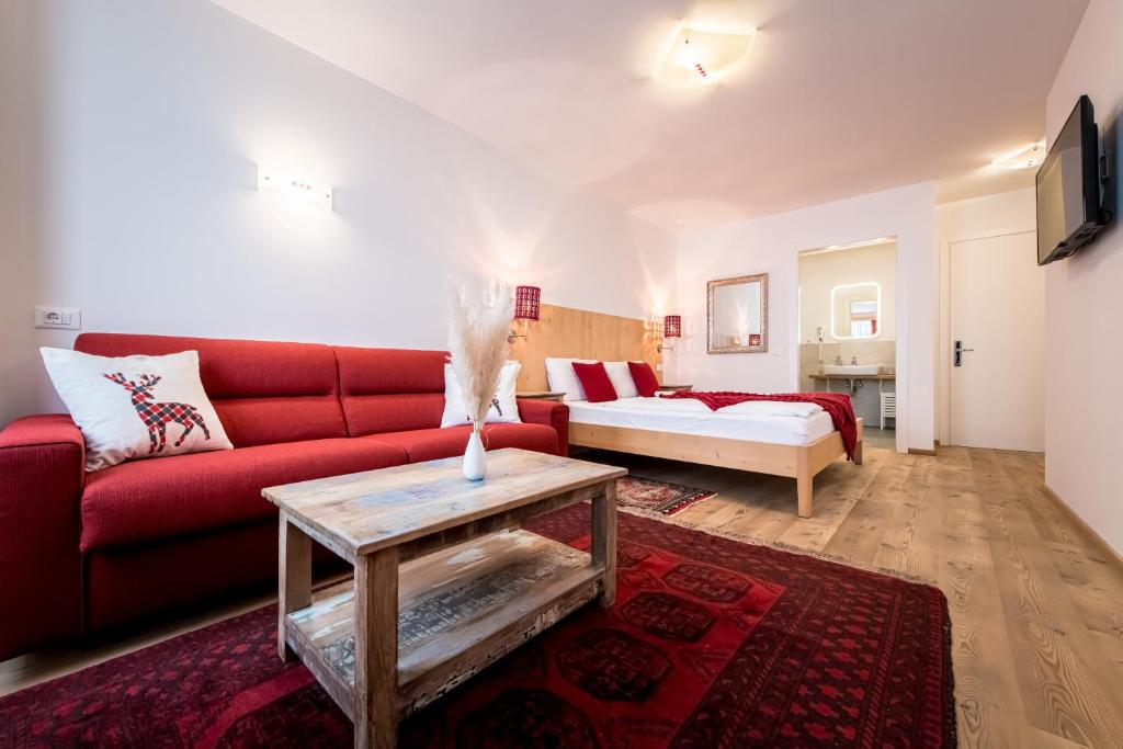 TV a/nebo společenská místnost v ubytování Am Schloss Guest House