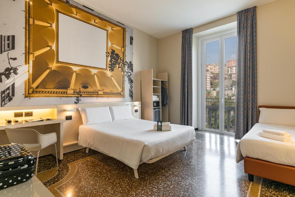 Postel nebo postele na pokoji v ubytování B&B Hotel Genova Principe