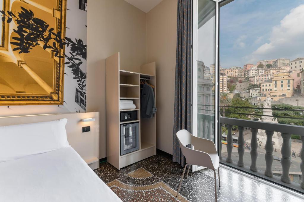 Postel nebo postele na pokoji v ubytování B&B Hotel Genova Principe