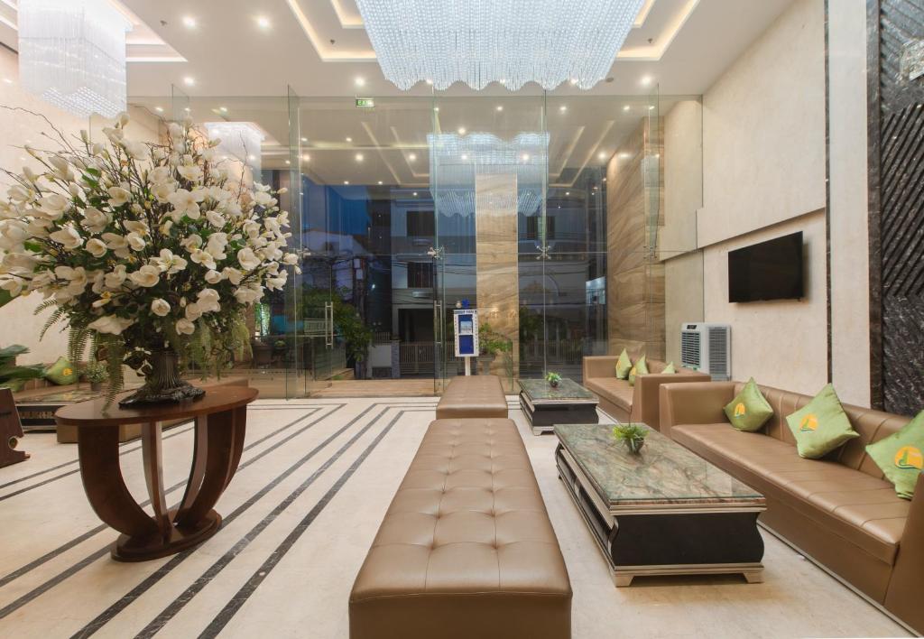 TV a/nebo společenská místnost v ubytování BN Boutique Nha Trang Beach