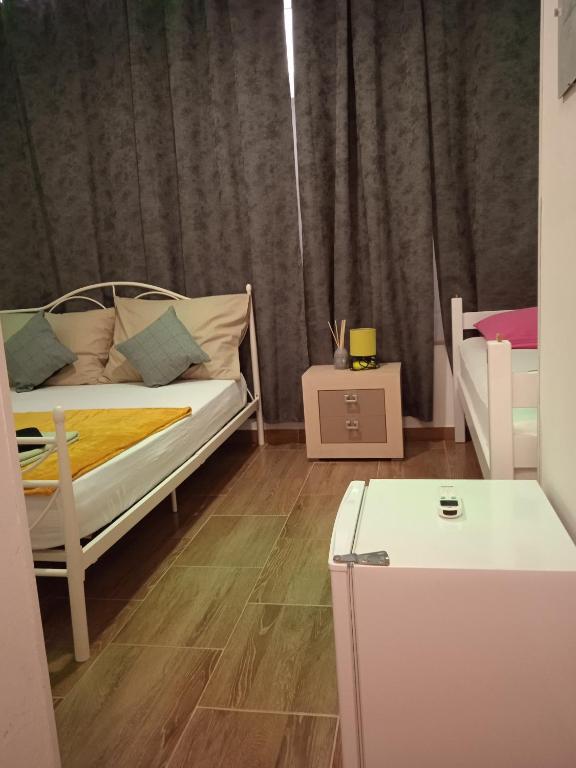 Postel nebo postele na pokoji v ubytování Dioklecijan delux