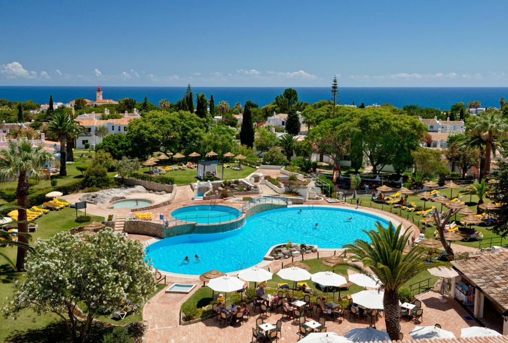 an aerial view of a resort with a swimming pool at Rocha Brava Village Resort in Carvoeiro