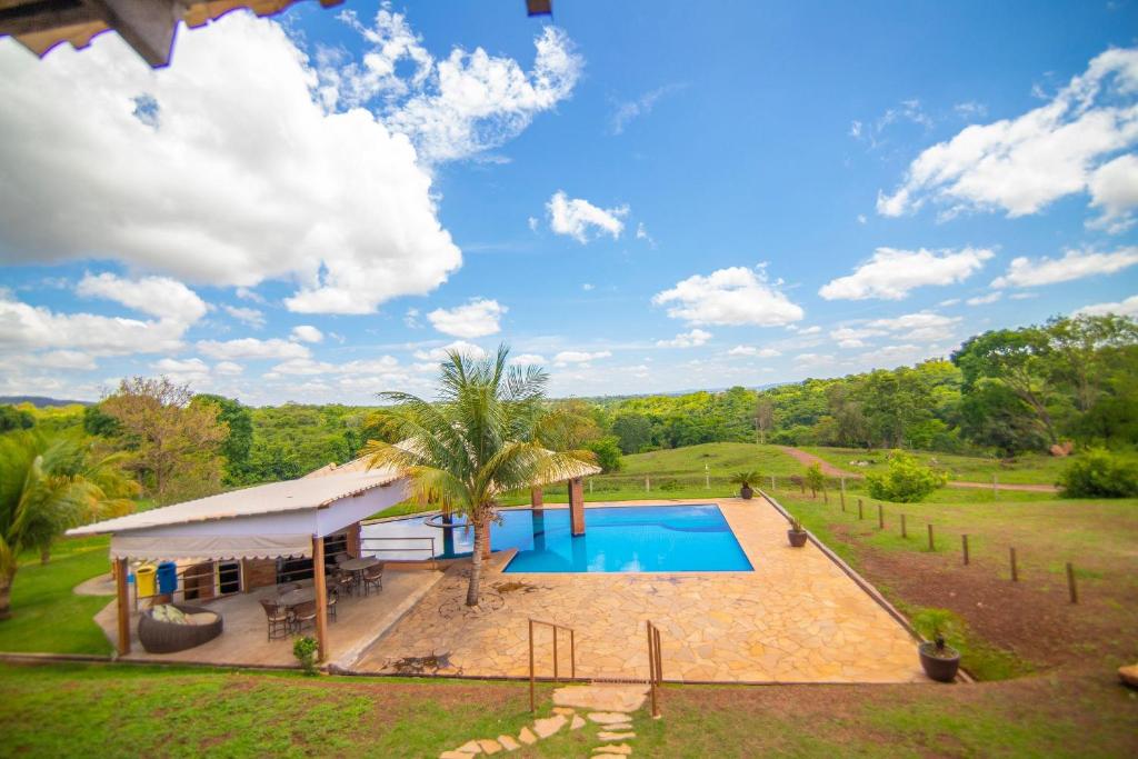 Bazén v ubytování Recanto de Lazer c/ Piscina, Bar molhado e Sinuca nebo v jeho okolí