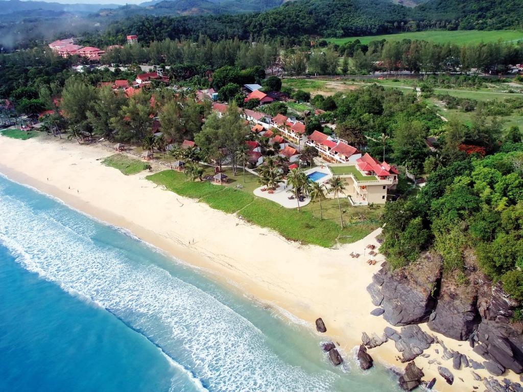 an aerial view of a resort on the beach at Frangipani Langkawi Resort in Pantai Cenang