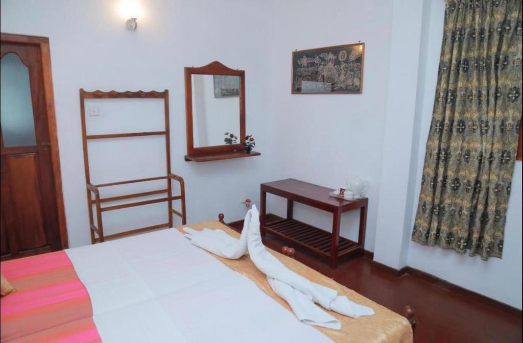 Postel nebo postele na pokoji v ubytování Villa 468 - Hikkaduwa