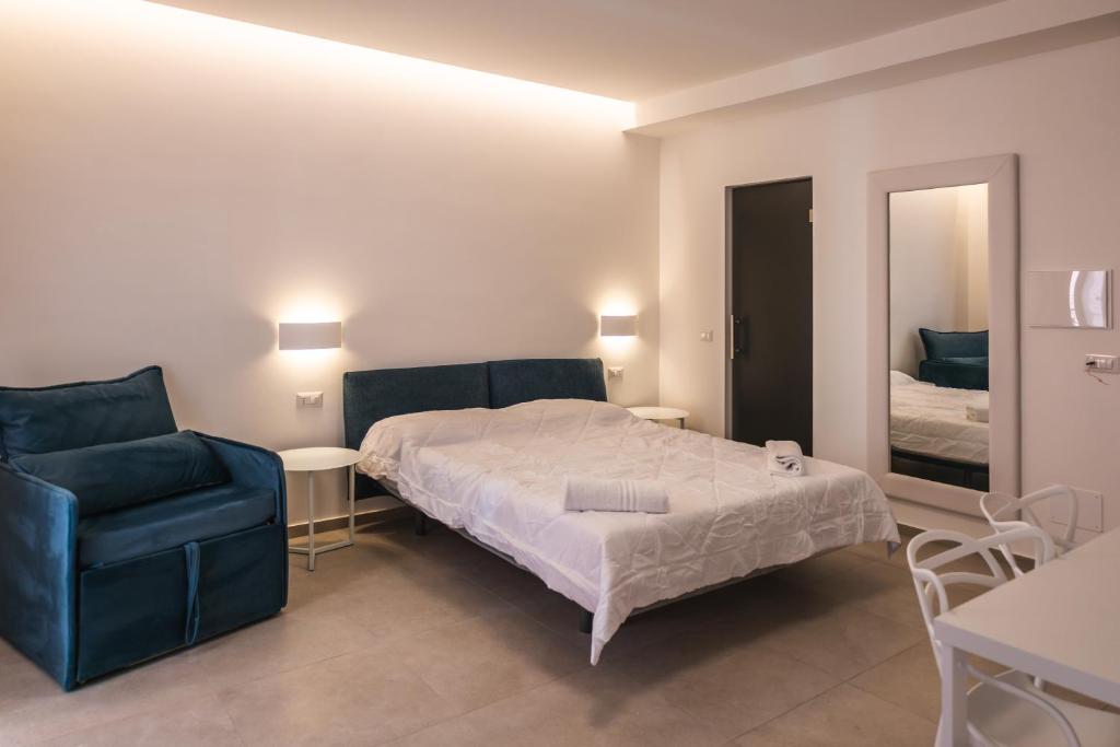 Postel nebo postele na pokoji v ubytování Aura Room