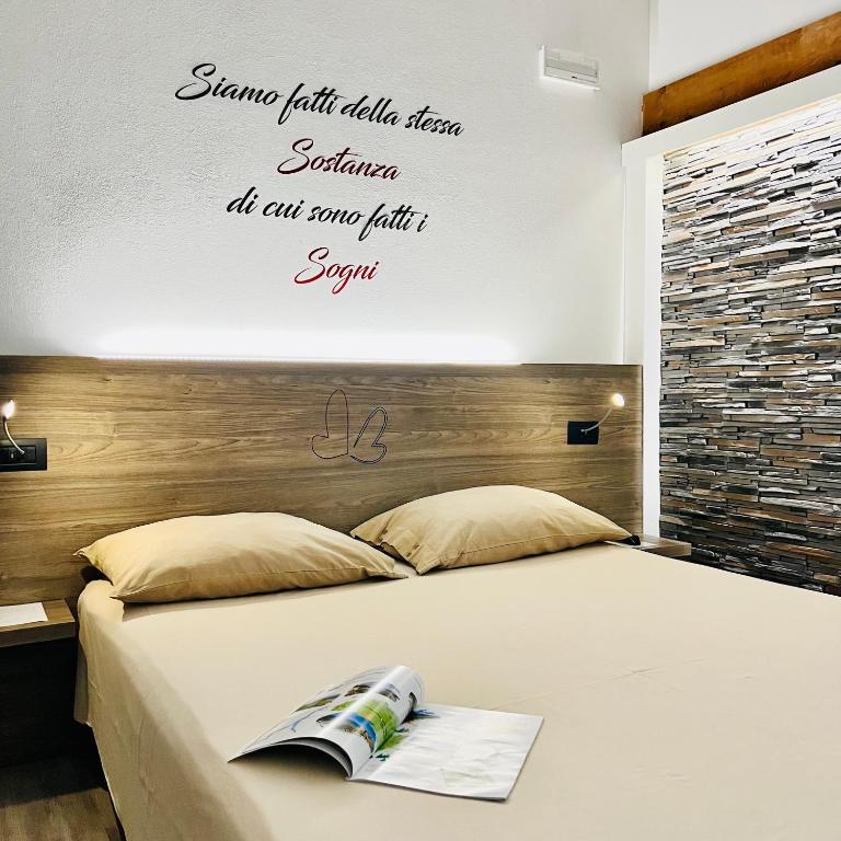 Posteľ alebo postele v izbe v ubytovaní B&B Valtellina Mon Amour