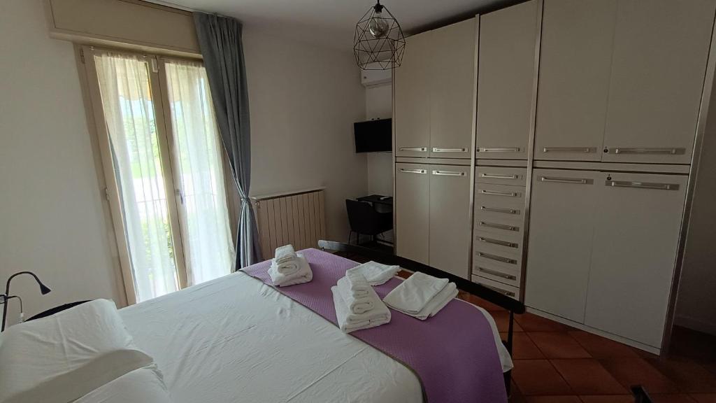 Postel nebo postele na pokoji v ubytování A Nest 4 Family