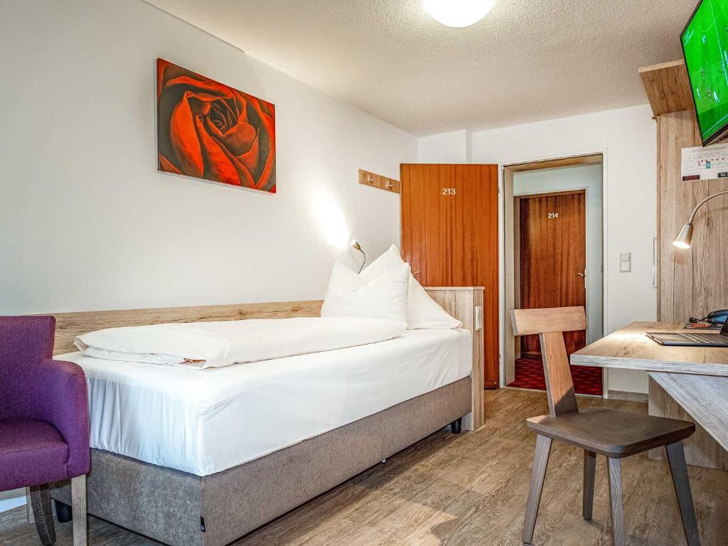 Postel nebo postele na pokoji v ubytování Gasthof Neuwirt