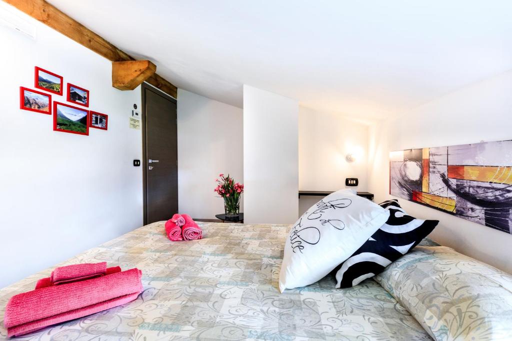 Posteľ alebo postele v izbe v ubytovaní B&B Valtellina Mon Amour