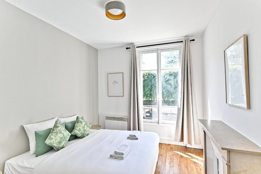 Postel nebo postele na pokoji v ubytování Appartement Spacieux et paisible Magnifique Vue