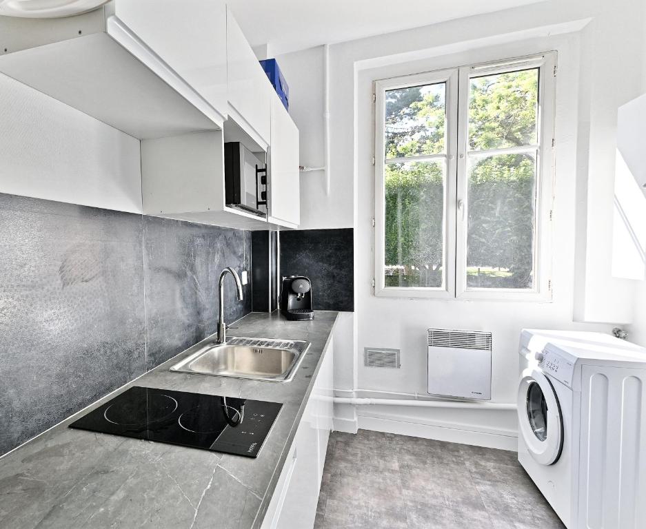Kuchyň nebo kuchyňský kout v ubytování Appartement Spacieux et paisible Magnifique Vue