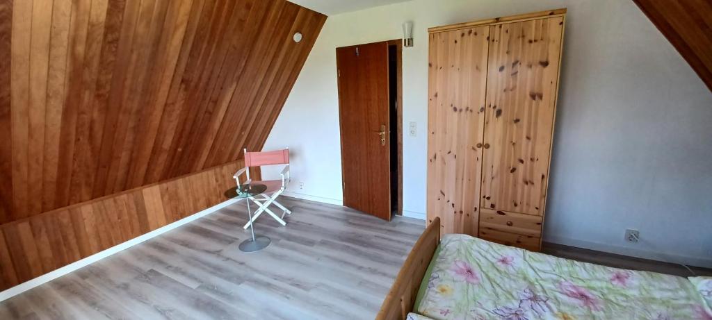 Postel nebo postele na pokoji v ubytování Ferienhaus mit Meerblick