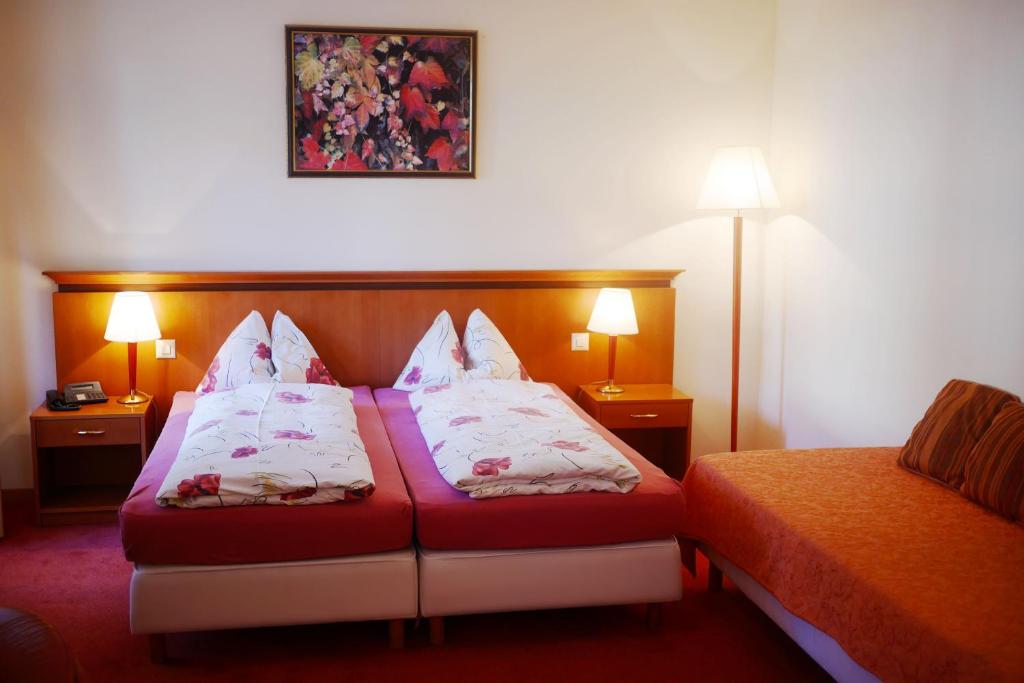 Postel nebo postele na pokoji v ubytování Auberge Communale à l'Union
