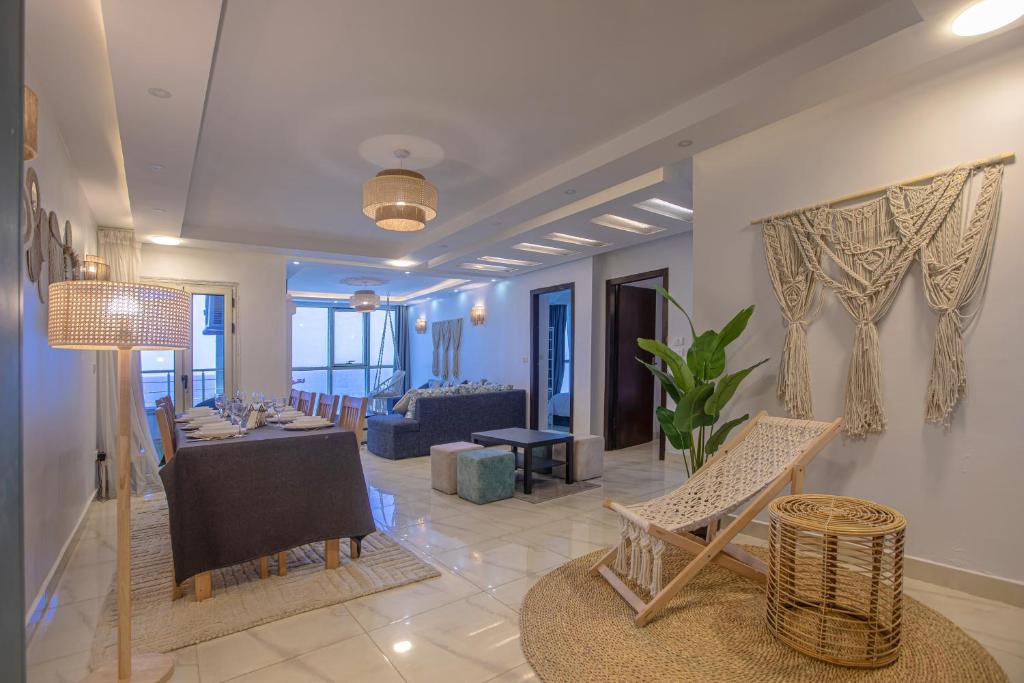 a dining room with a table and chairs at Skyline Premium Properties in Alexandria