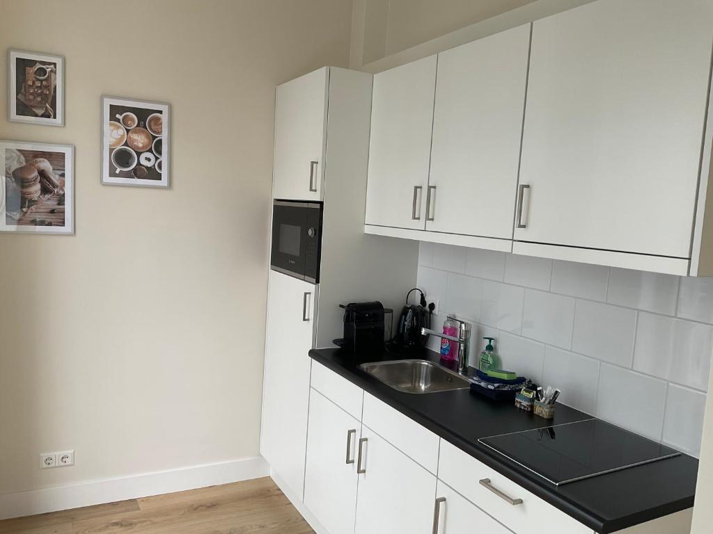 Küche/Küchenzeile in der Unterkunft Aristoteles Apartments
