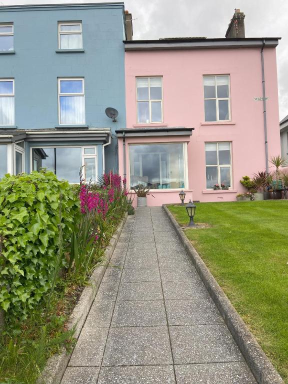 a walkway in front of a house at Dolly's Cottage in Warrenpoint