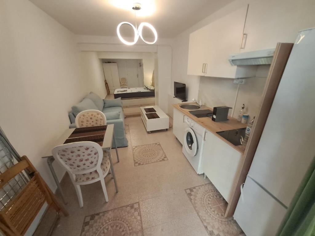 an overhead view of a kitchen and a living room at Apartamento MOTA 8 in Xeraco