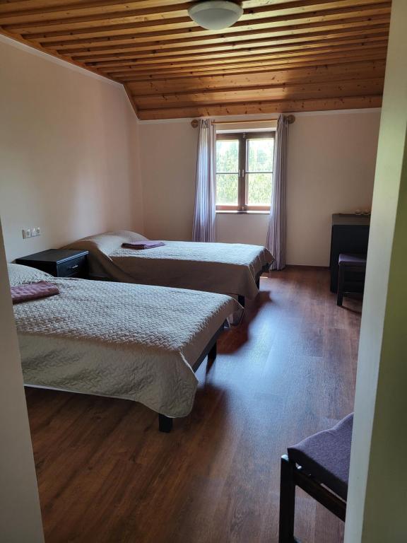 Postel nebo postele na pokoji v ubytování Goodwin Guest House