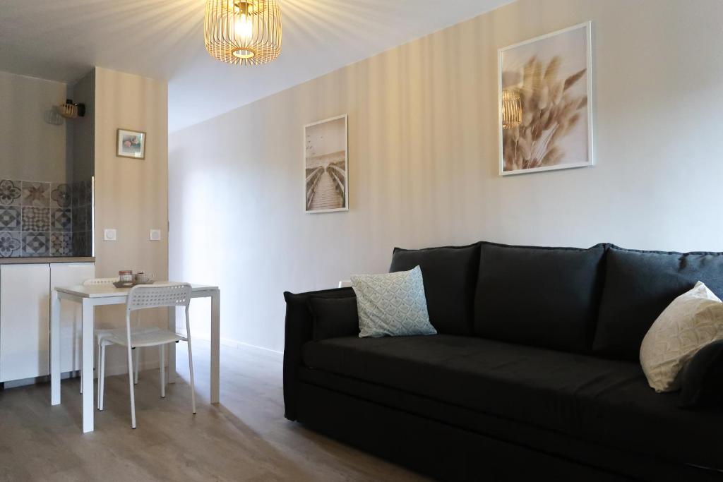 Posezení v ubytování Magnifique studio Le FLAMANT DORE avec Loggia, Terrasse & Climatisation, Proche Mer