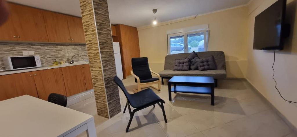 TV a/nebo společenská místnost v ubytování RAY APARTMENT