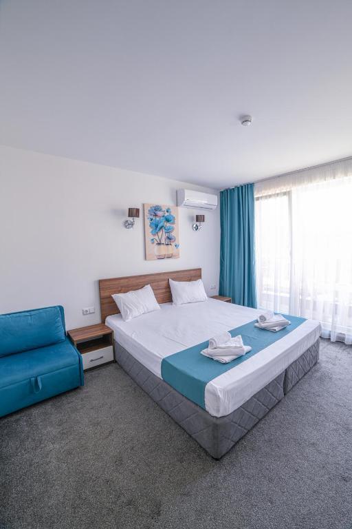 A bed or beds in a room at Hotel Zonya