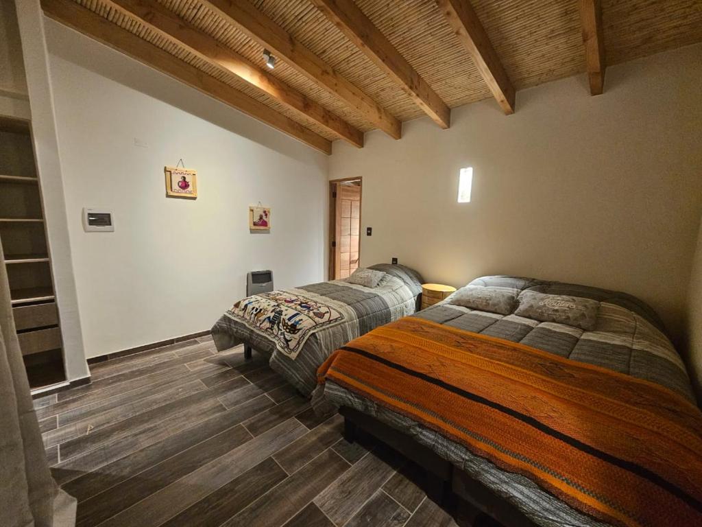Postel nebo postele na pokoji v ubytování Hotel Pirwa