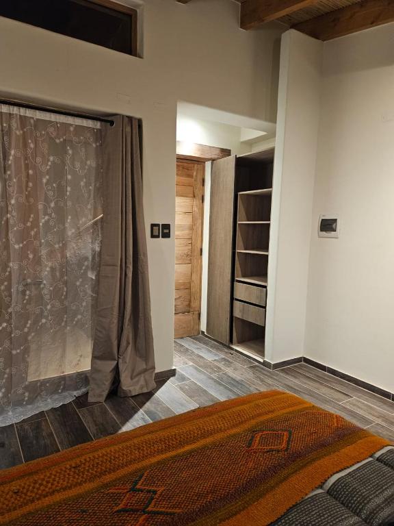 Postel nebo postele na pokoji v ubytování Hotel Pirwa