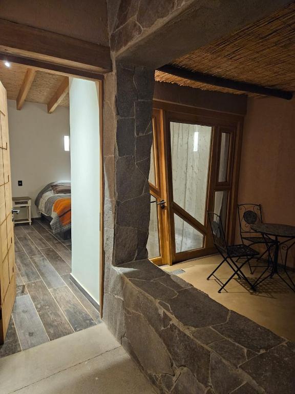 Postel nebo postele na pokoji v ubytování Hotel Pirwa