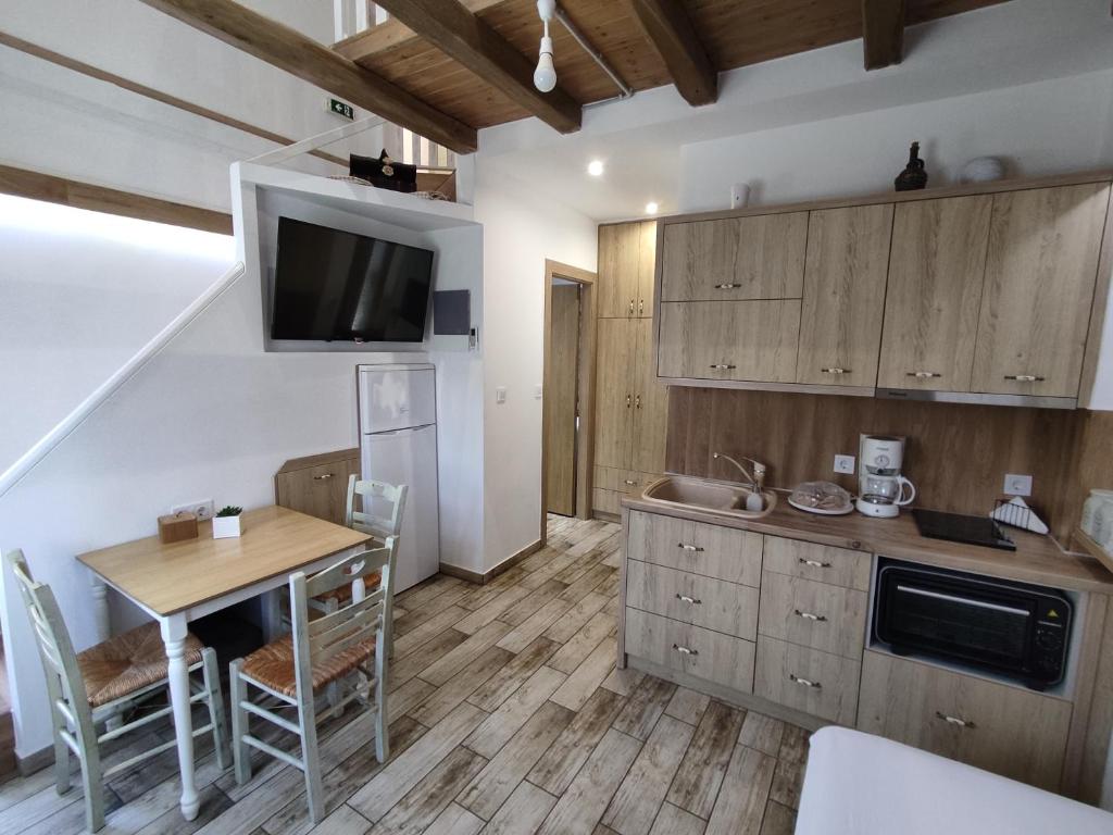 Kuchyň nebo kuchyňský kout v ubytování Green House Skiathos