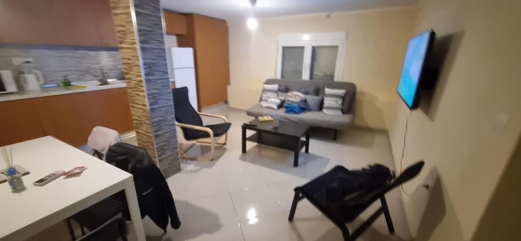 TV a/nebo společenská místnost v ubytování RAY APARTMENT