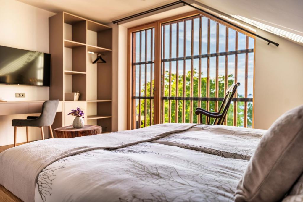 Postel nebo postele na pokoji v ubytování Hotel Frost