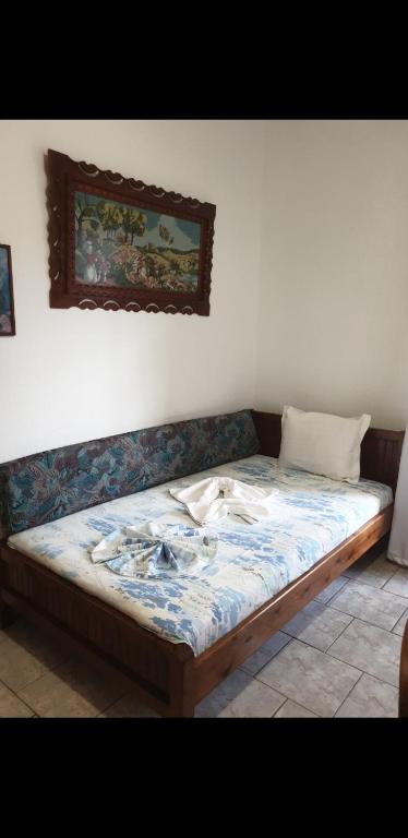 Postel nebo postele na pokoji v ubytování Aliki