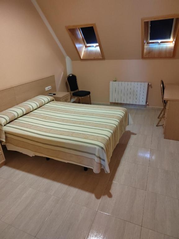 Ένα ή περισσότερα κρεβάτια σε δωμάτιο στο Hotel La Estrella de Castillejo