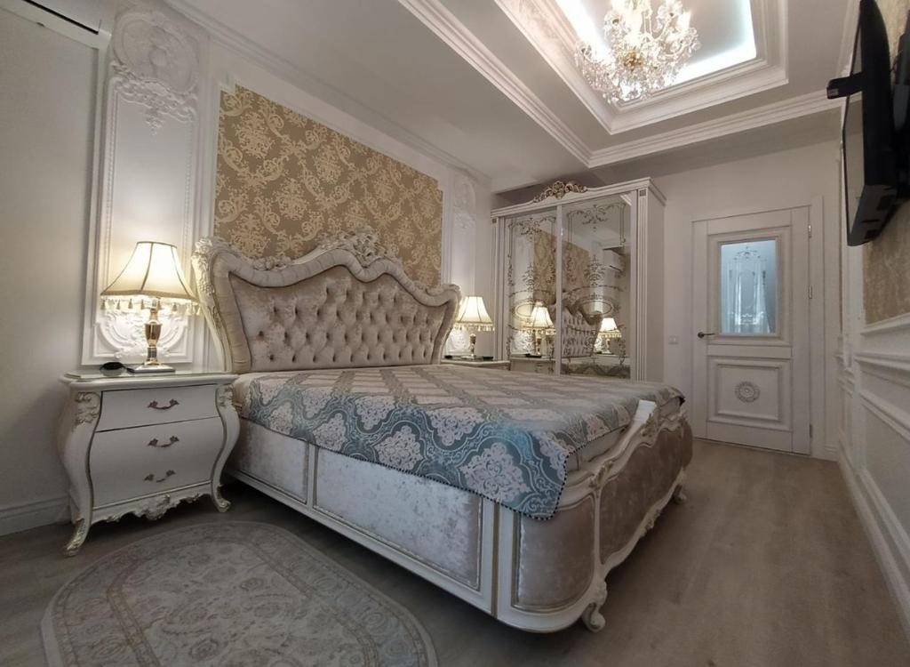Postel nebo postele na pokoji v ubytování Luxury Star
