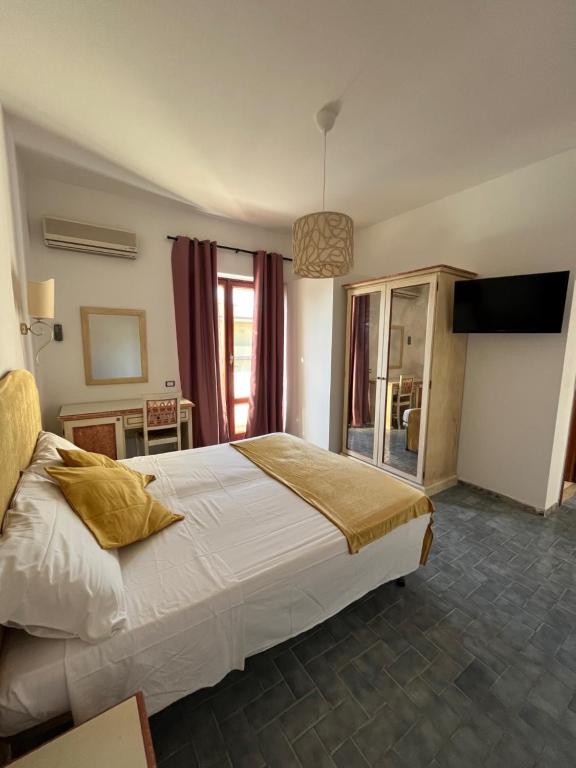 Postel nebo postele na pokoji v ubytování TC HOTEL