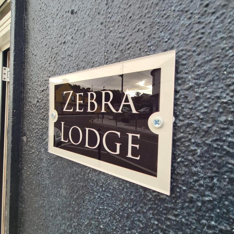 Certifikát, hodnocení, plakát nebo jiný dokument vystavený v ubytování Zebra Lodge
