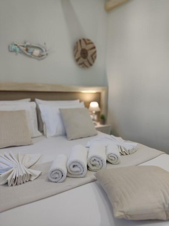 Postel nebo postele na pokoji v ubytování Villa Kaldera Skiathos