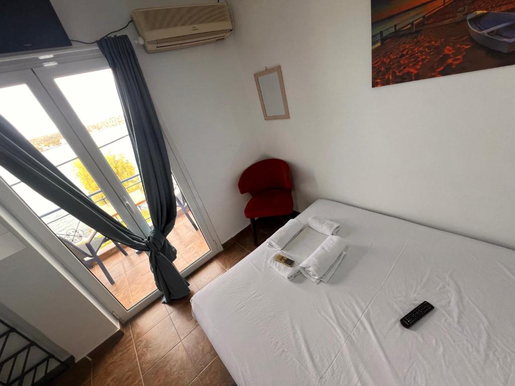 Postel nebo postele na pokoji v ubytování blue Hotel