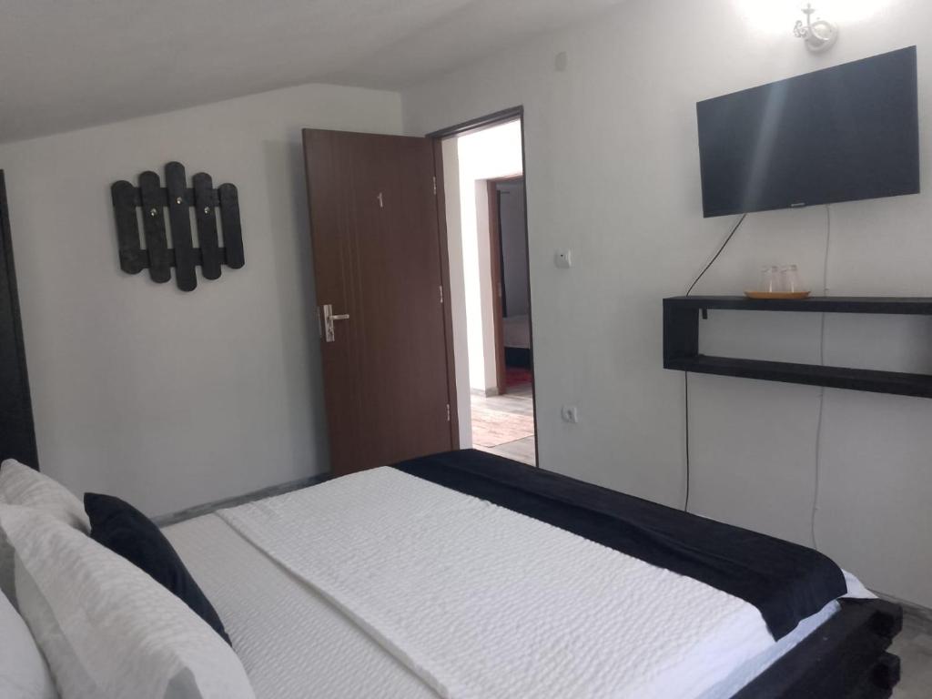 Postel nebo postele na pokoji v ubytování Casa Cătă&Daria duplex