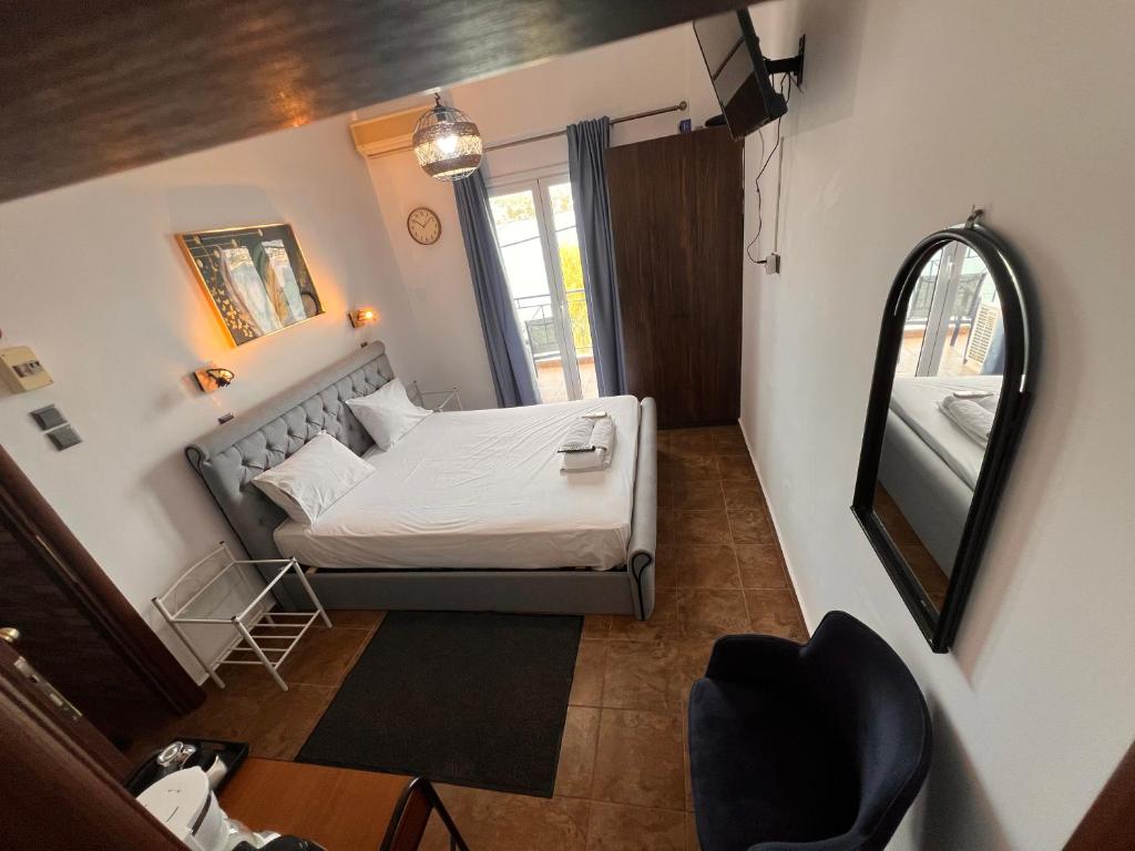 Postel nebo postele na pokoji v ubytování blue Hotel